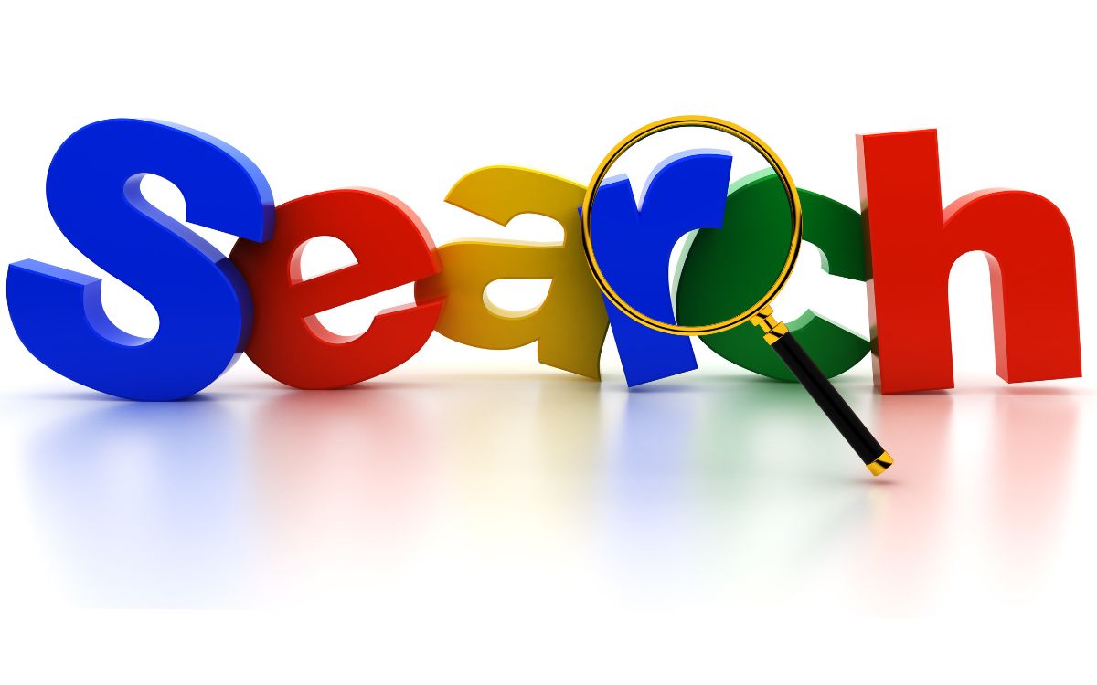 Colorful search letters viewed through a magnifying glass